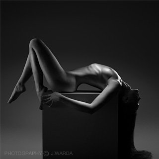 young nude female body relaxing by j.warda the naked pixel fine art nude photography